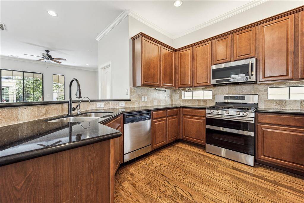 Ample storage and stainless steel appliances make this kitchen a chef's dream.