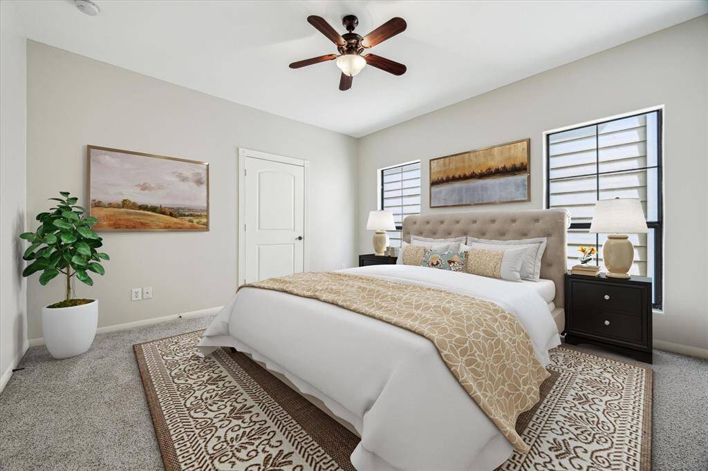 Your third floor primary suite is bright and cozy with NEW carpet and paint - never livied on!