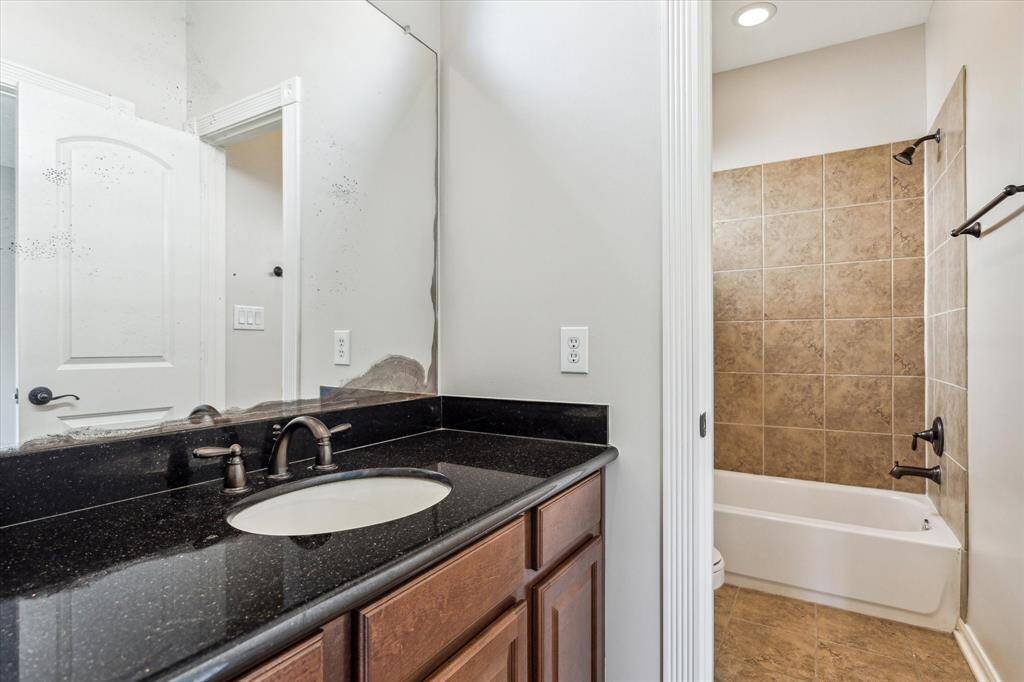 The second of TWO guest full bathrooms.