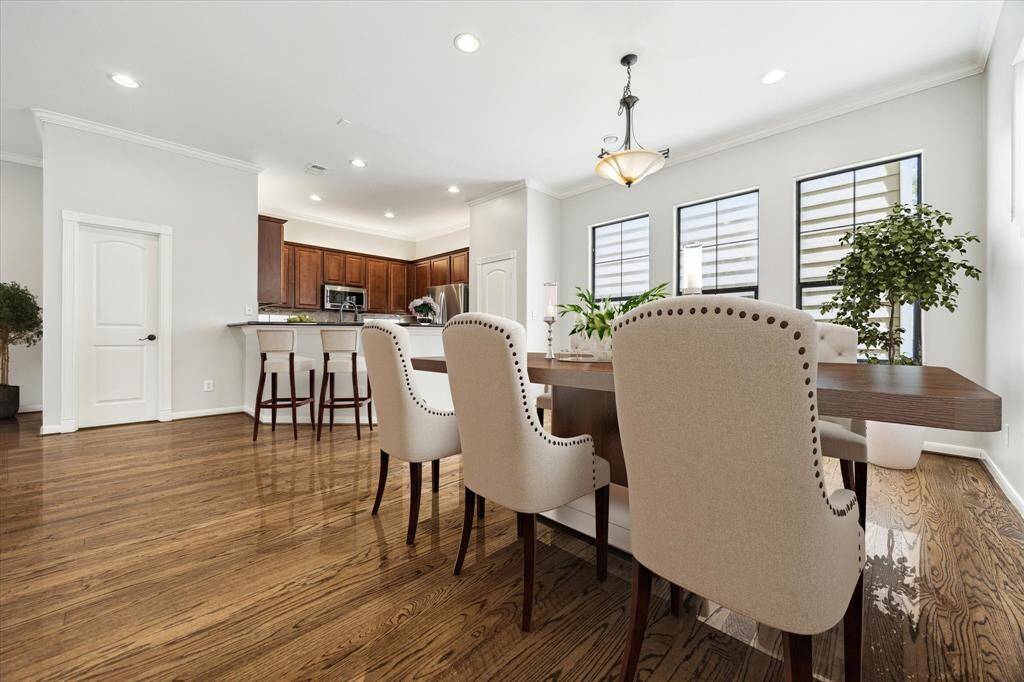The second floor living space is perfect for entertaining with spacious dining area for guests.