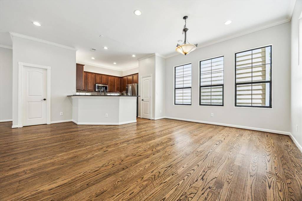 Hardwood floors and fresh paint throughout make this living space a stand out.