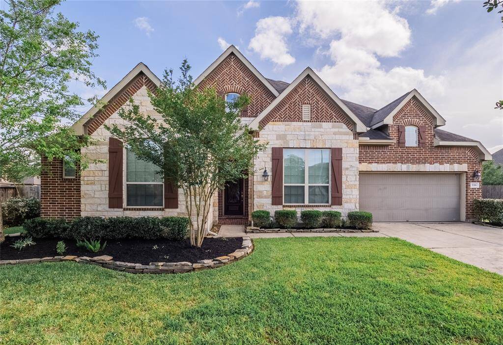 Welcome Home, 5316 Savannah Bend in Lakes of Savannah. beautiful all brick home with the stone accent front
