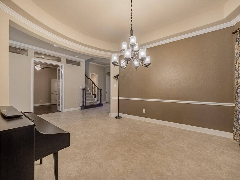 from this view of the formal dining you can see the office and staircase