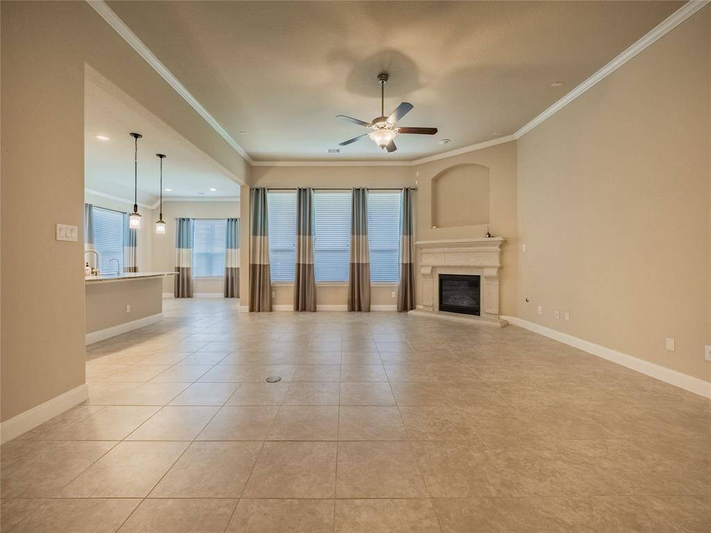 this is a view of the family room from the staircase very open , spacious with lots of windows