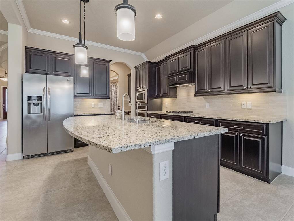 here you can see the extra wide counter top , lots of cabinet space stainless steel appliances