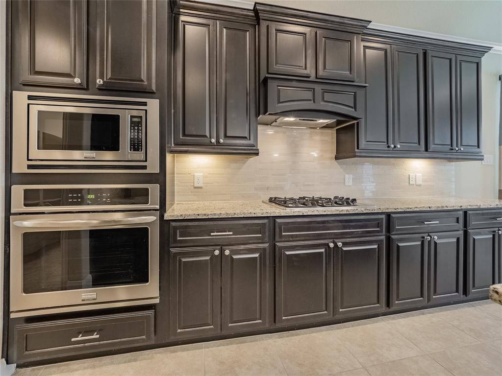 lots of cabinet space , range top and wall oven and microwave , also is under counter lighting