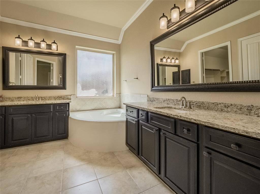 both vanities have granite counter tops  great lighting