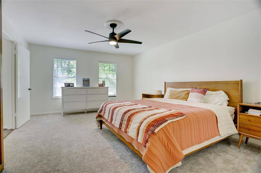 The sizable primary bedroom stands alone from the rest of the rooms and offers front to back privacy.