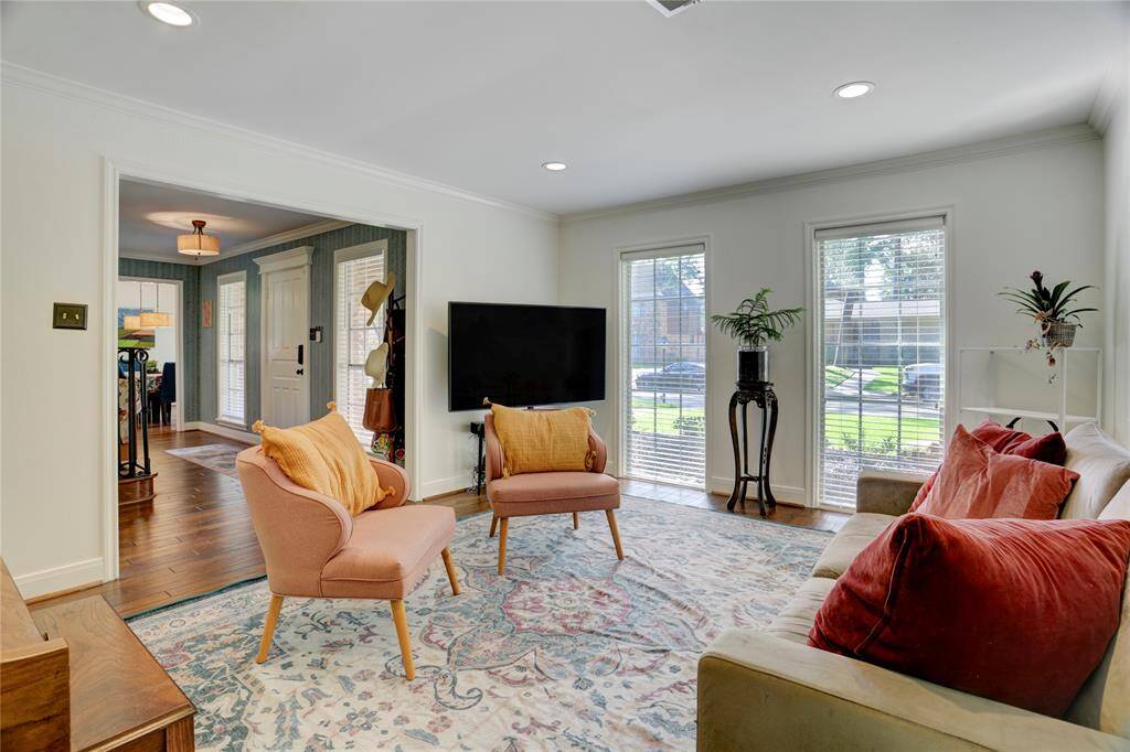 Just off the foyer is the formal living room facing Coral Gables.