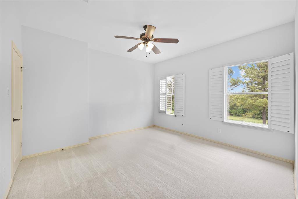 Guest bedroom 1 with fresh paint & carpet.