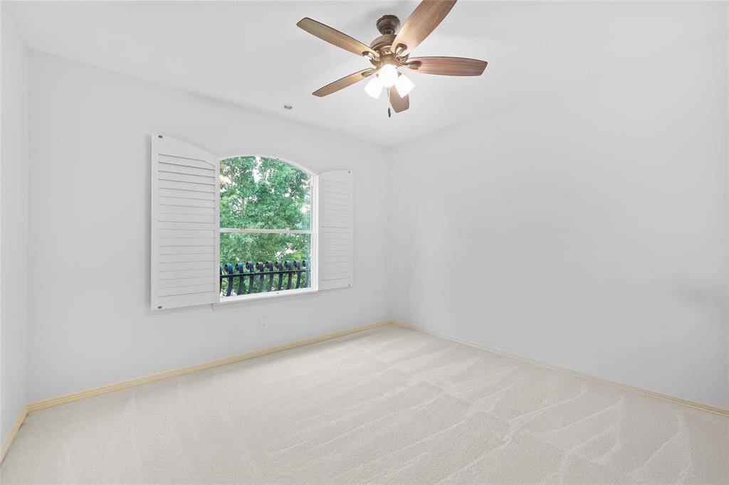 Guest Bedroom 2 with fresh paint & carpet.