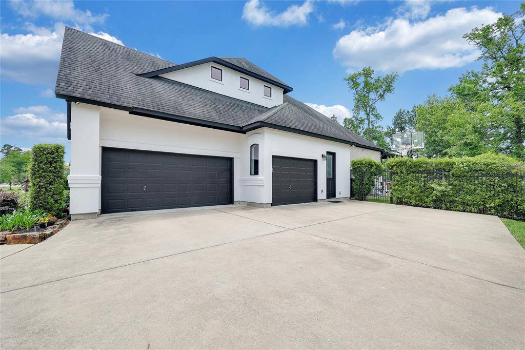 Driveway with 3 car garage.
