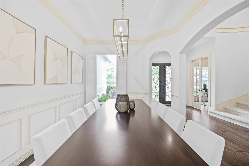 Your formal dining room with recently updated light fixture.