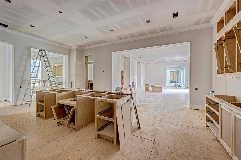 Kitchen as of April 3, 2025. Open to the spacious living room. Breakfast room and guest suite entrances to the left.