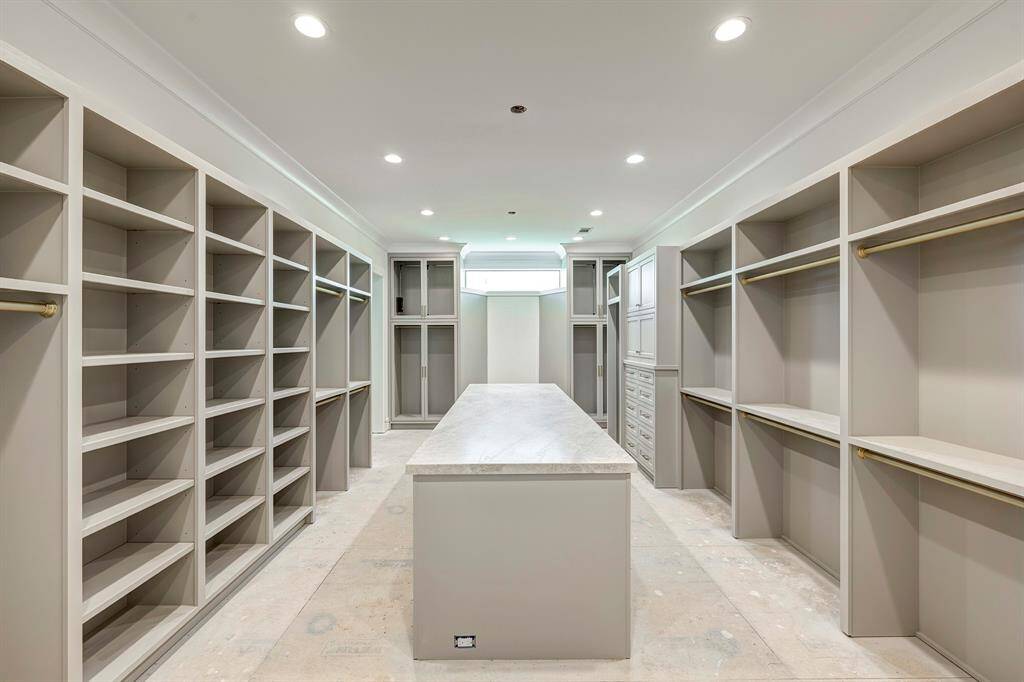 Her closet as of April 17, 2025. Three-way mirror to be installed beyond island.