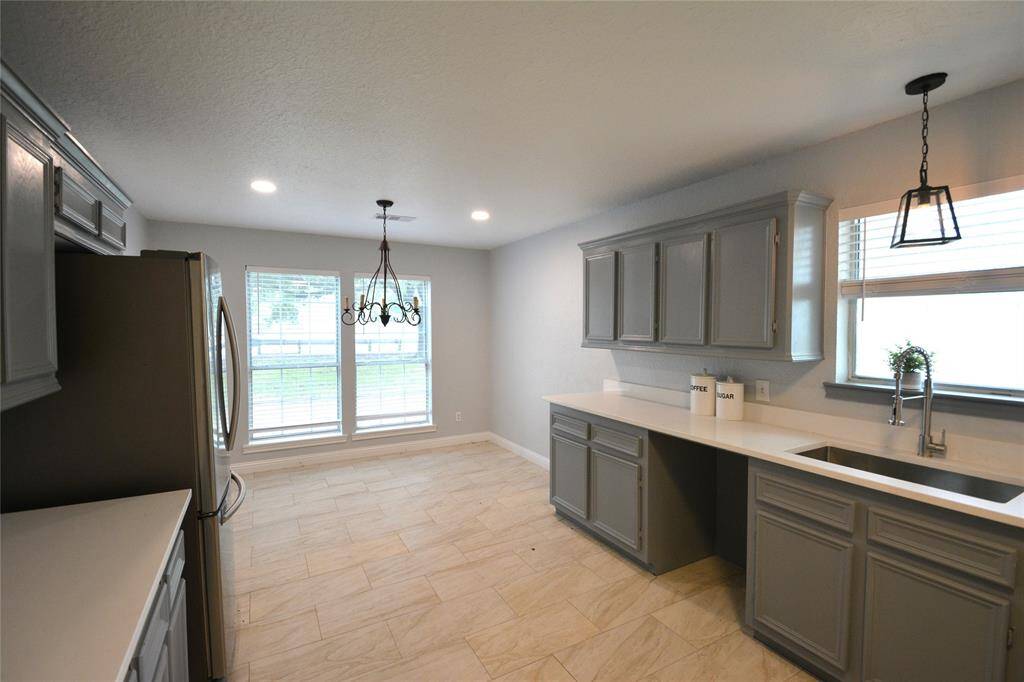 Dining area is ready for your table and chairs.