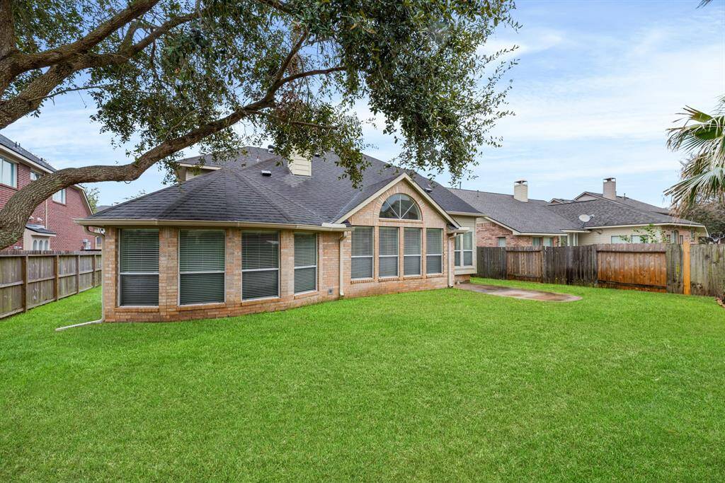 Backyard perfect for entertaining and playing.