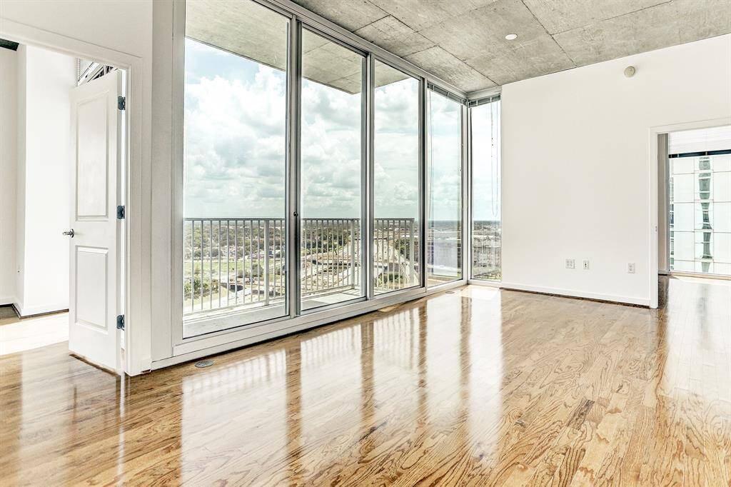 The 12x20 SF Living Room has a wall of windows with sweeping views to the southeast.