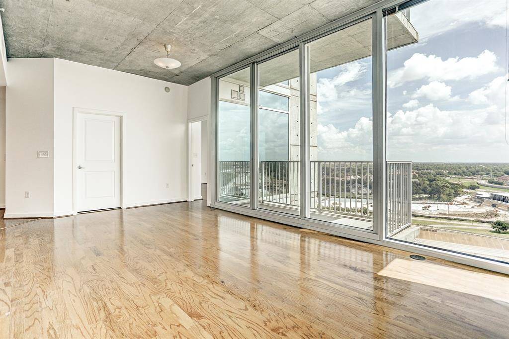 The living room has balcony access.