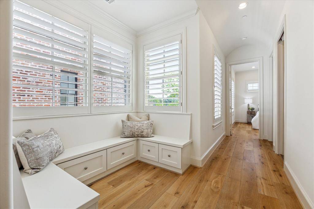 Cute seating nook between the primary and secondary bedrooms.