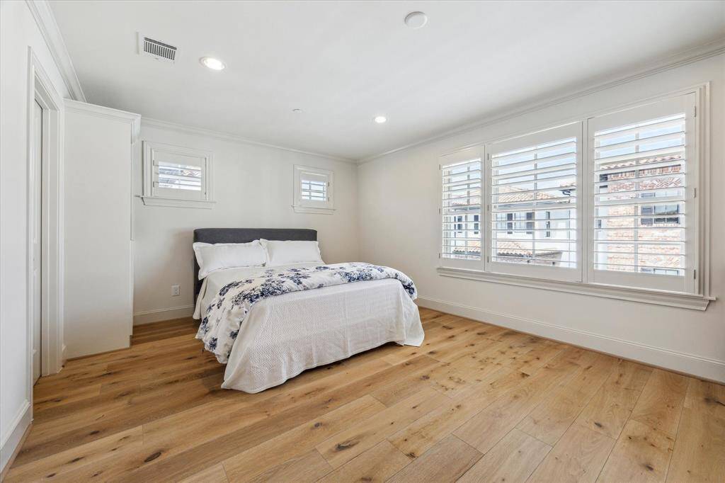 The 4th bedroom (20' x 12') is located on the 3rd floor and could provide an office or bonus room. The bedroom includes a walk-in closet and ensuite bath.
