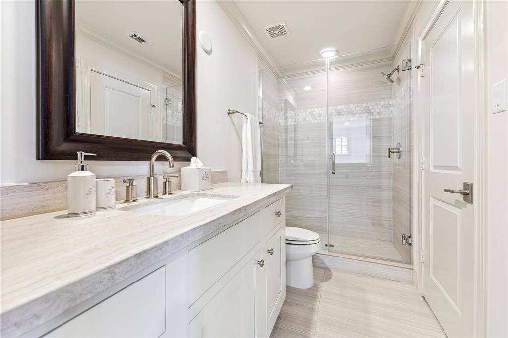 Private bath on the 3rd floor offers a walk-in shower.