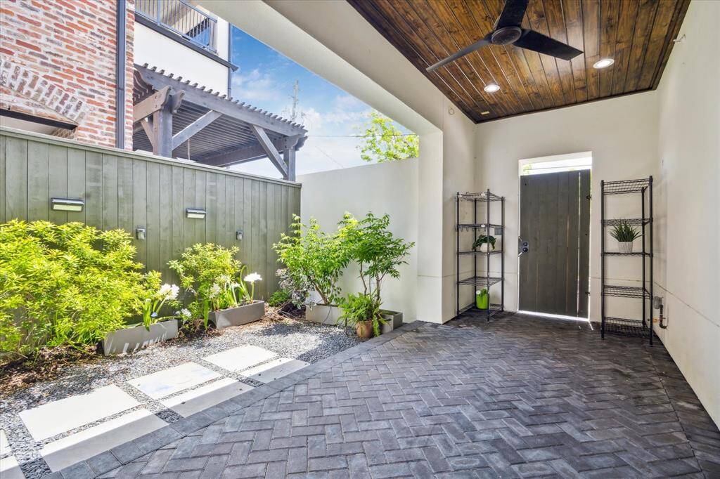 Back patio on the 1st level offers many opportunities for gardening and grilling.