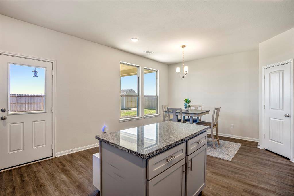 Flooded with natural light from expansive windows!