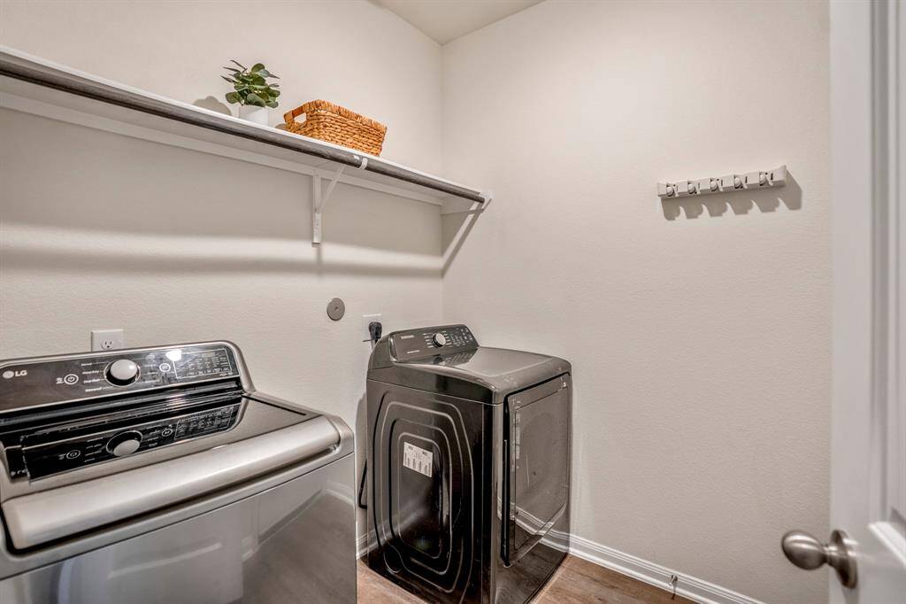 Spacious laundry room ready for your personal touch!