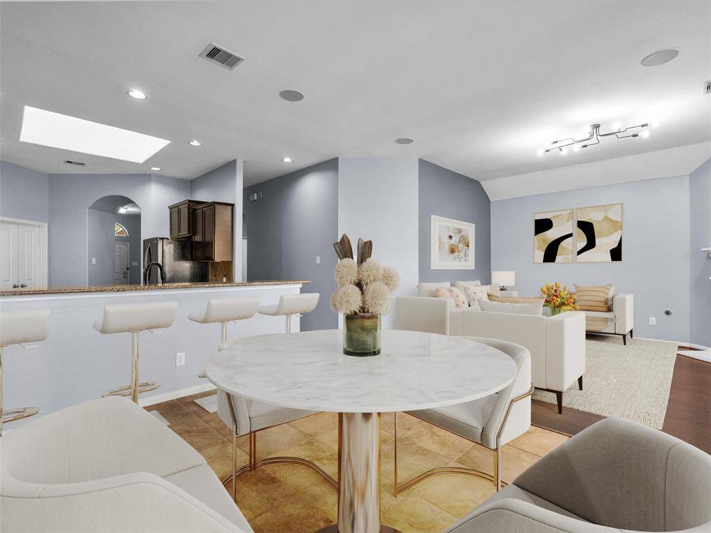 Breakfast area looking inot the kitchen and living room