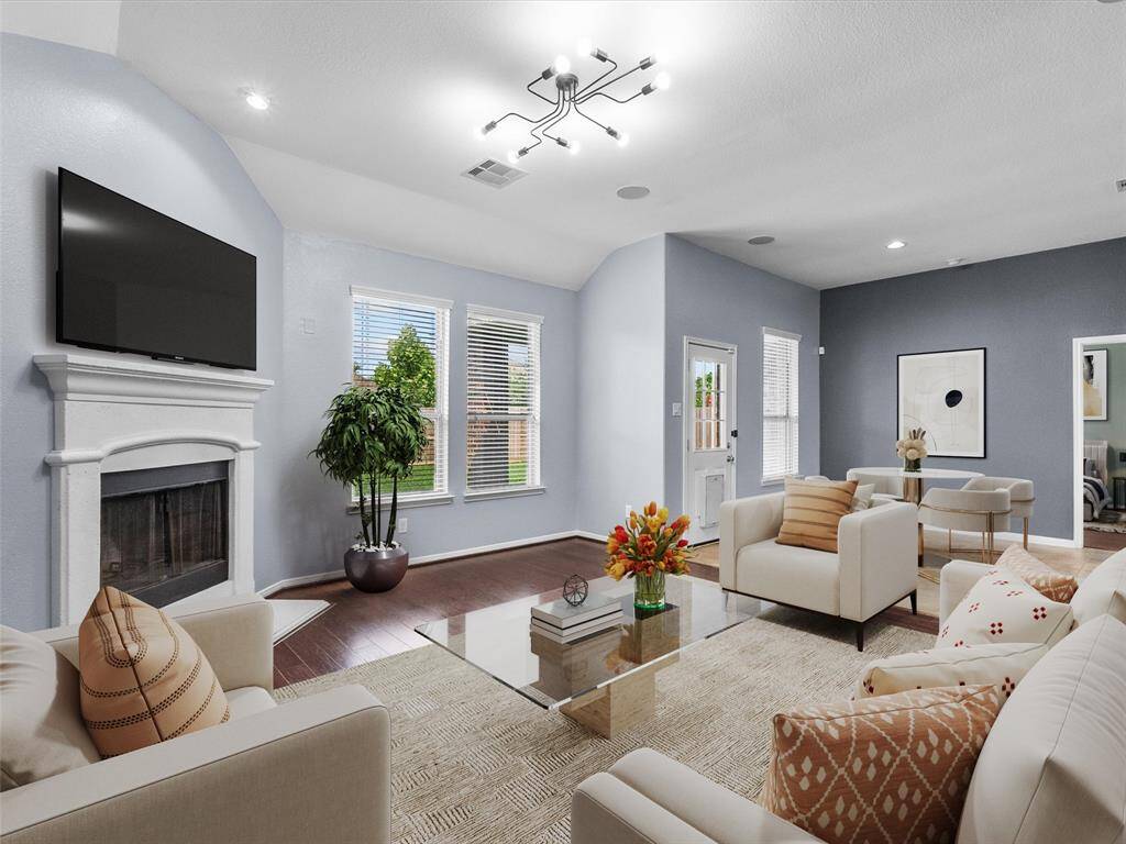 The living room features a cozy fireplace