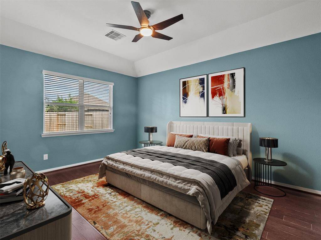 Primary bedroom features a private en-suite bath