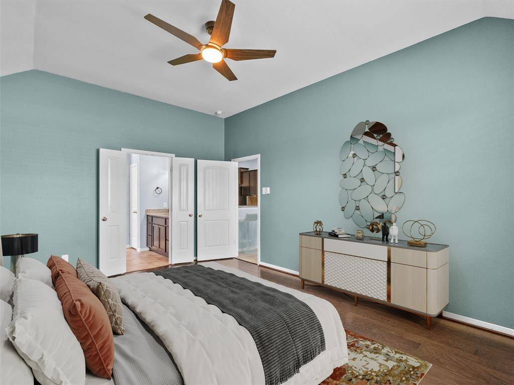 Primary bedroom features a private en-suite bath
