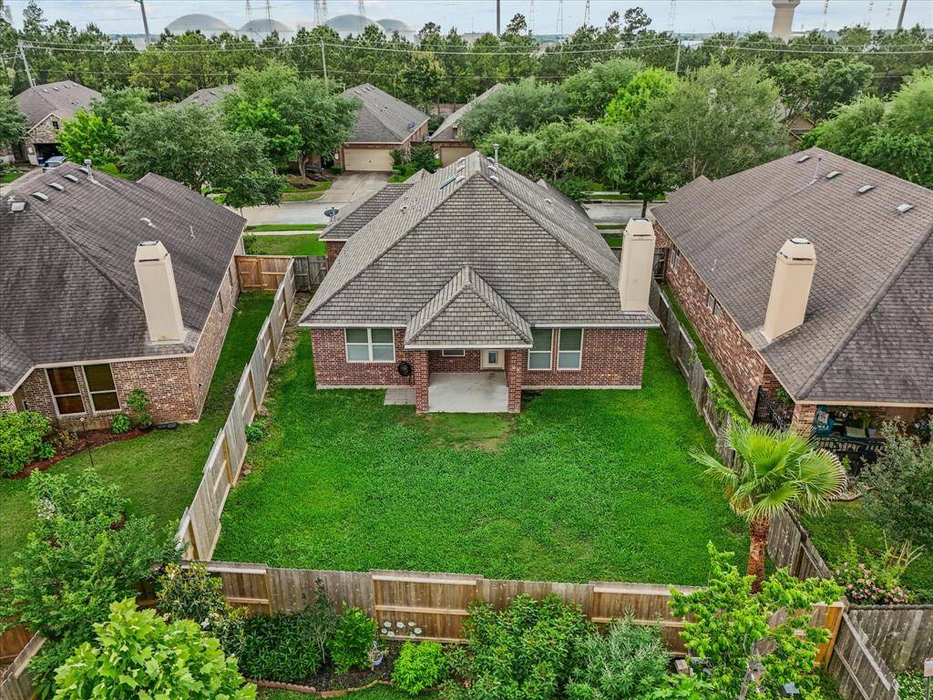 Nice size backyard with a covered patio