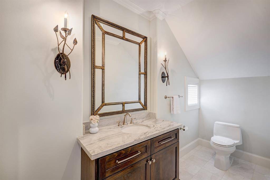 powder room near formal dining (one of two half baths on the first floor)