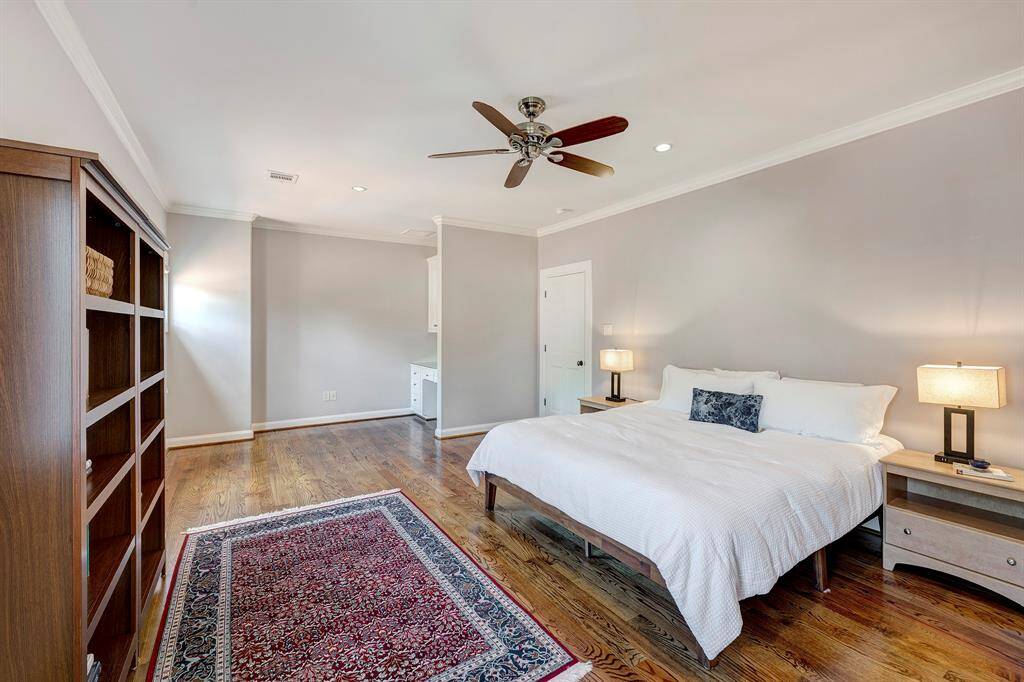 XL secondary ensuite bedroom upstairs that could be a second primary suite; walk-in closet and a bonus closet to serve all of your storage needs