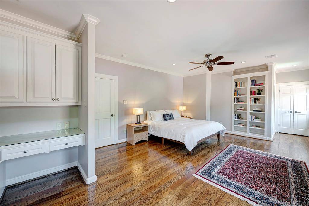 XL secondary ensuite bedroom upstairs that could be a second primary suite; walk-in closet and a bonus closet to serve all of your storage needs