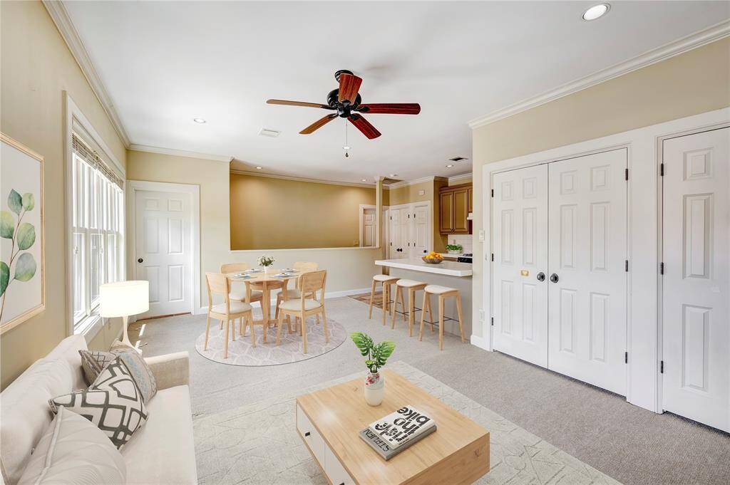 Garage apartment (924 sf per HCAD) with full kitchen and large living room (virtually staged)