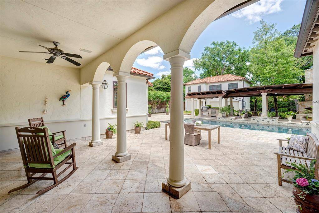 Walk from the formal living out to your Mediterranean paradise