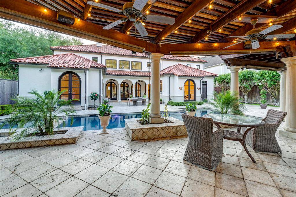 View from loggia to pool and into the back of the house