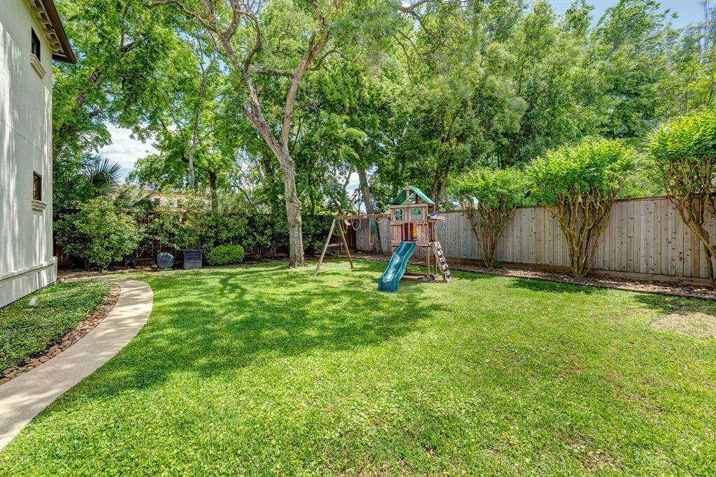 With all that this home has to offer, you can still have a large grassy lawn