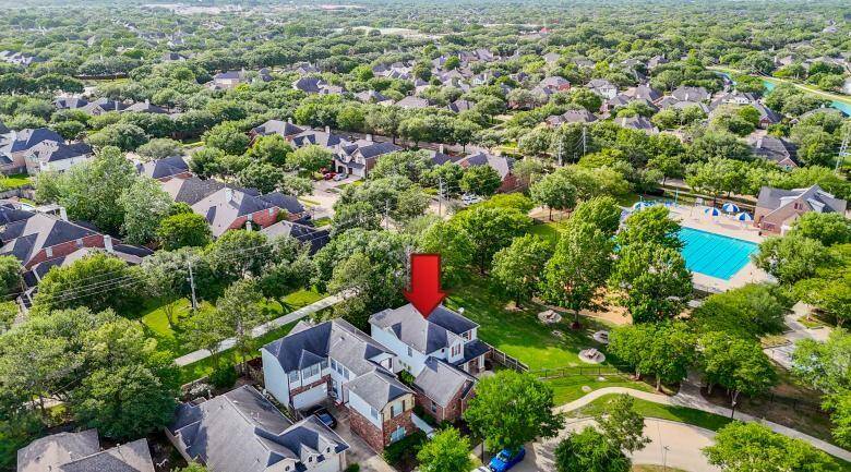 Here you are, in a special community and walking distance to the olympic pool and park.