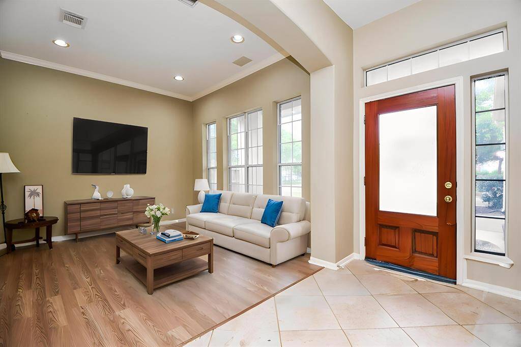 This space can be used as a roomy home office or as a formal sitting/living space. Virtually staged.