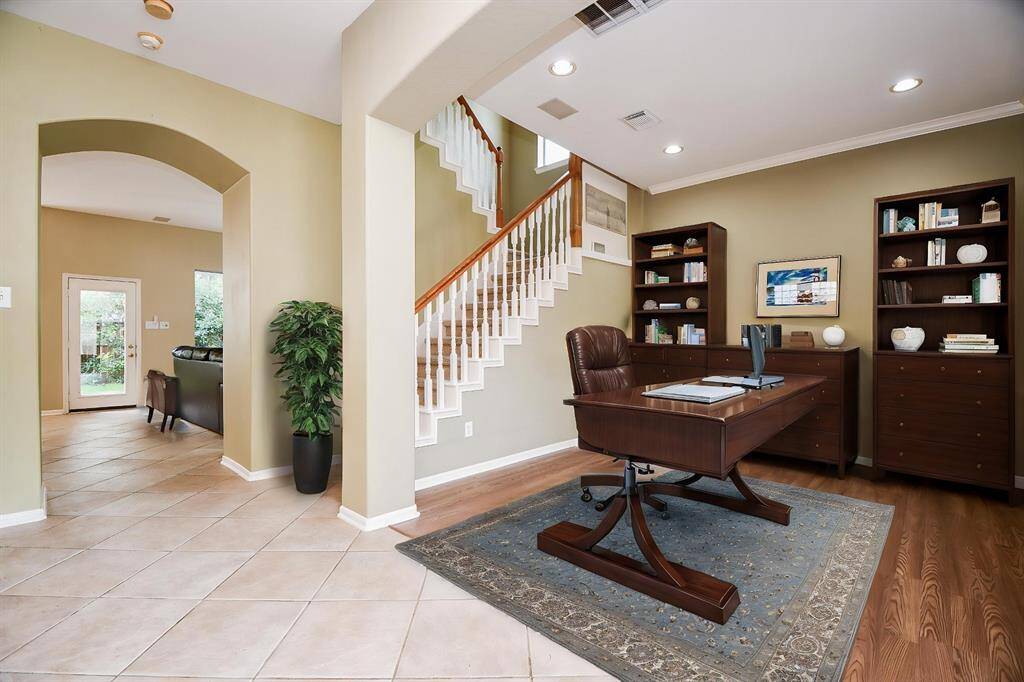 Another idea for the use of this space: a formal living area filled with natural light. (Virtually staged).