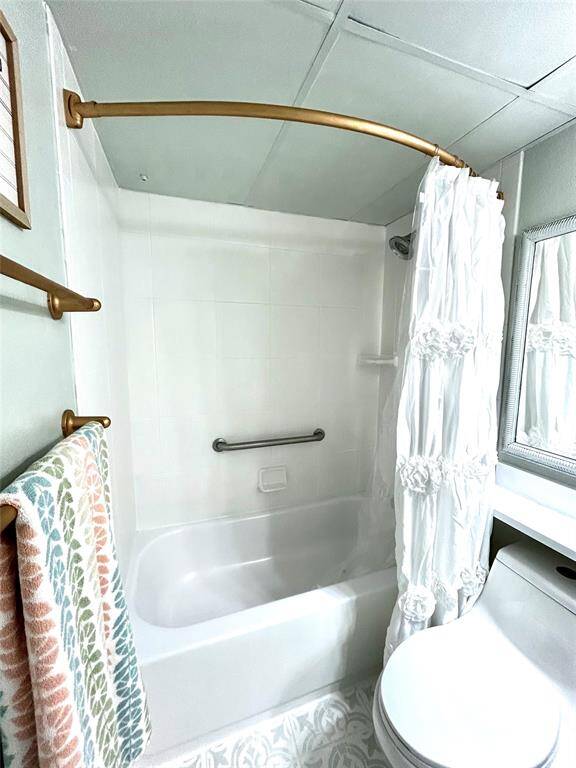 Another view of the updated bathroom that opens to the hall and a door to the bedroom