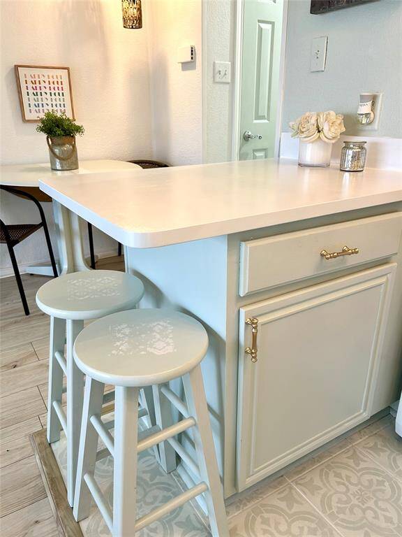 Eat at bar with newly painted barstools!