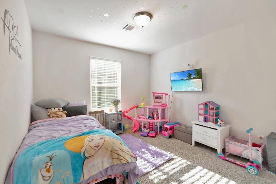 Bedroom #2 has plenty of natural light.
