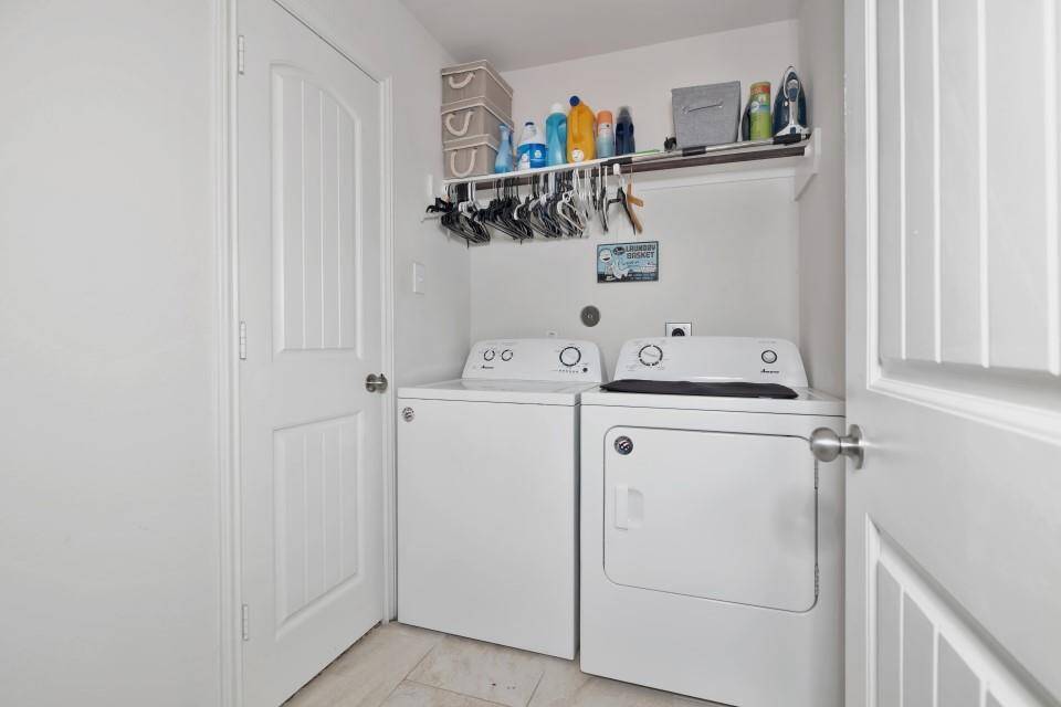 Large utility room, the utility room also features direct access to the Primary Bedroom Closet.