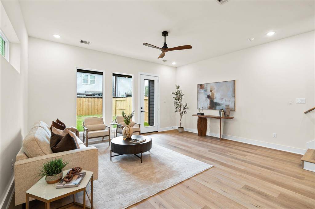 First floor living leads to your backyard covered patio.*Photos from a previous home by the same developer, selections and floor plans may vary*