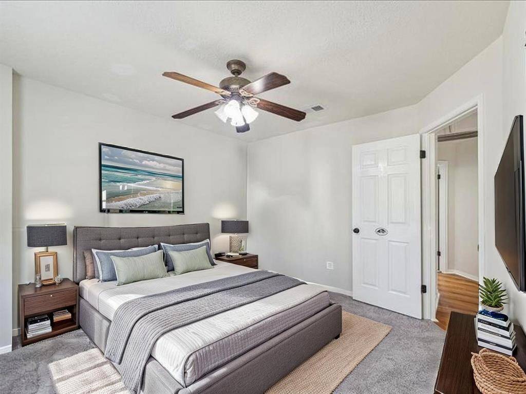 BRIGHT SECONDARY BEDROOM WITH BRAND-NEW CARPETING. **This room has been virtually staged.